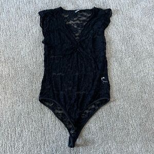 Women’s Lace bodysuit size L NWOT
